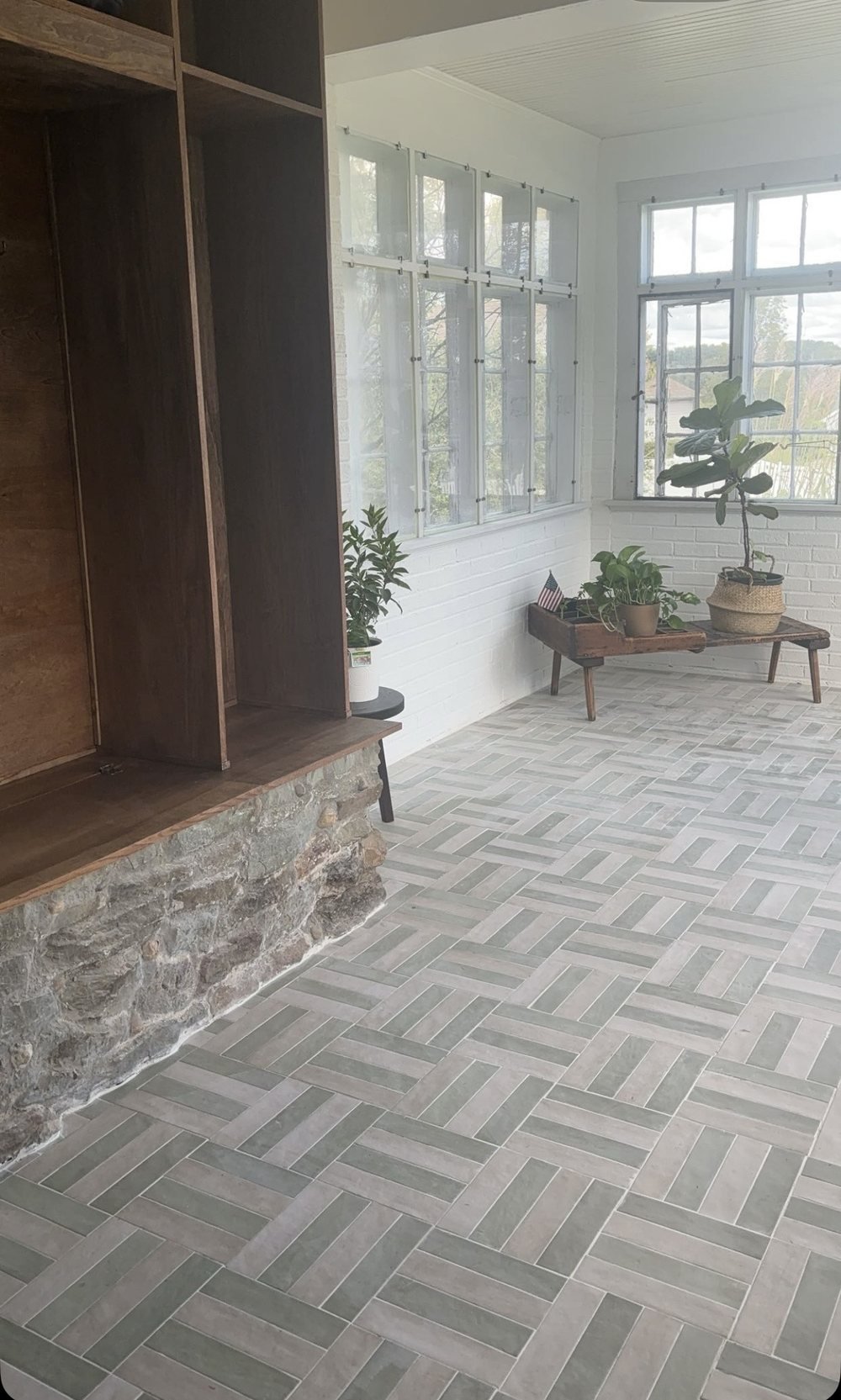 Sunroom with newly installed tile flooring